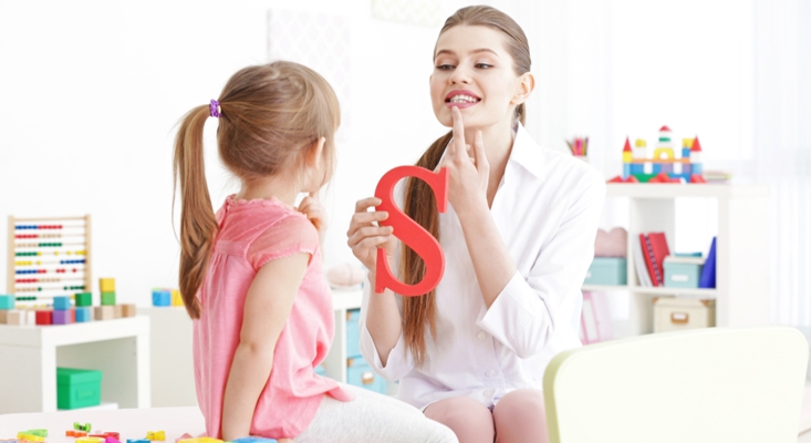 Cute little girl at speech therapist office